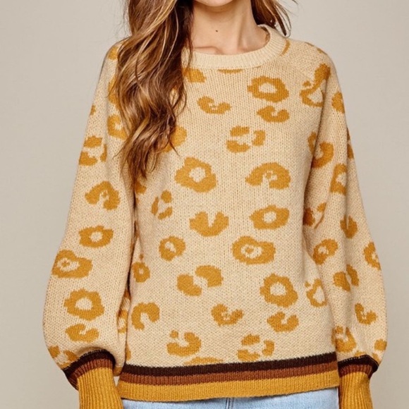 Taupe Leopard Sweater with contrasted color neckline, sleeves and hemline. - Picture 3 of 6